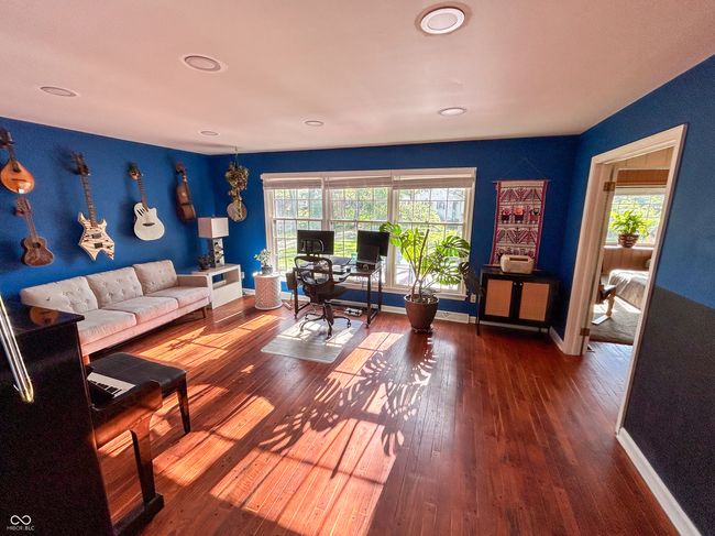 Living room offers tons of natural light and connectivity to dining room | Image 13