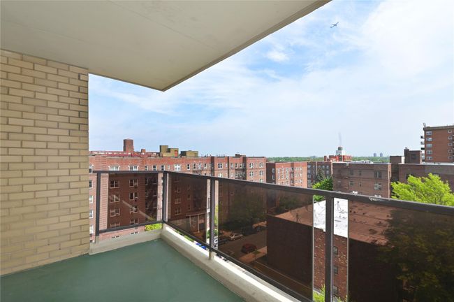 Balcony featuring a view of city | Image 4
