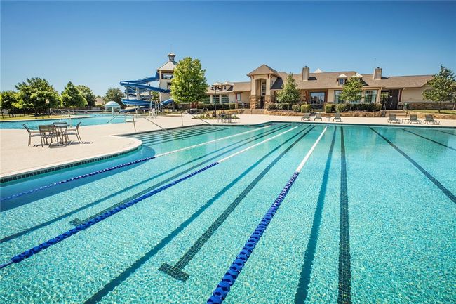 ShadowGlen offers two big pools, a children’s splash pad area, and twisting, towering water slides | Image 16