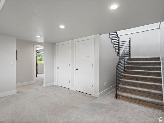 Below grade area with baseboards, stairs, recessed lighting, and carpet flooring | Image 43