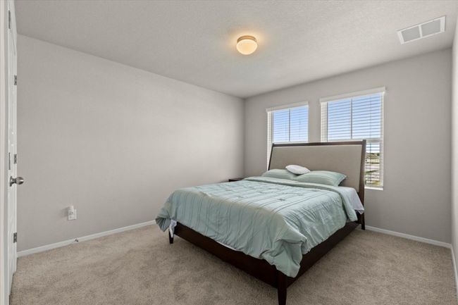 Bedroom featuring carpet and baseboards | Image 27