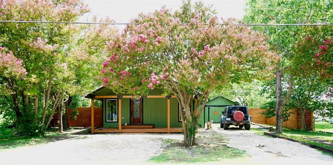 View of front of home with driveway and covered porch | Image 27
