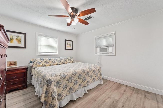 Spacious primary suite with ample closet space. | Image 11