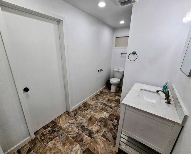 Spacious bath with door that opens into bedroom #2 | Image 16