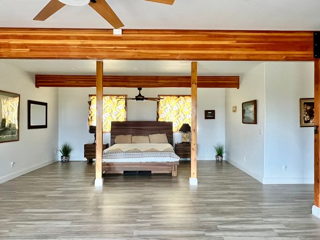 Spacious living space below primary BR | Image 15