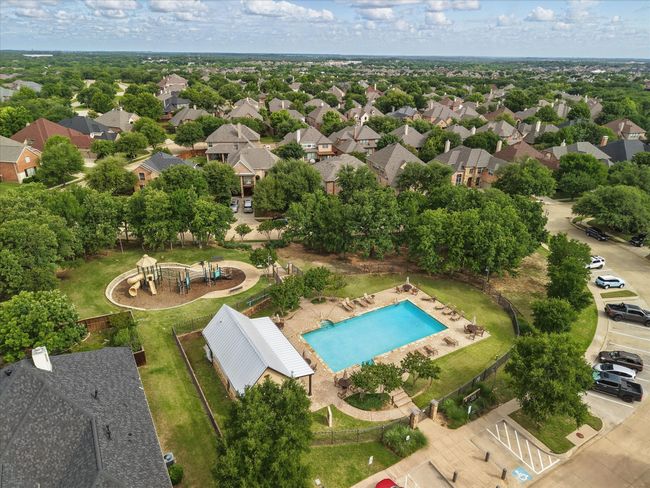 Aerial view of residential area featuring a pool | Image 40