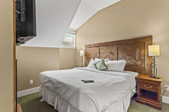402 - 191 Kananaskis Way, Condo with 3 bedrooms, 3 bathrooms and 1 parking in Canmore AB | Image 28