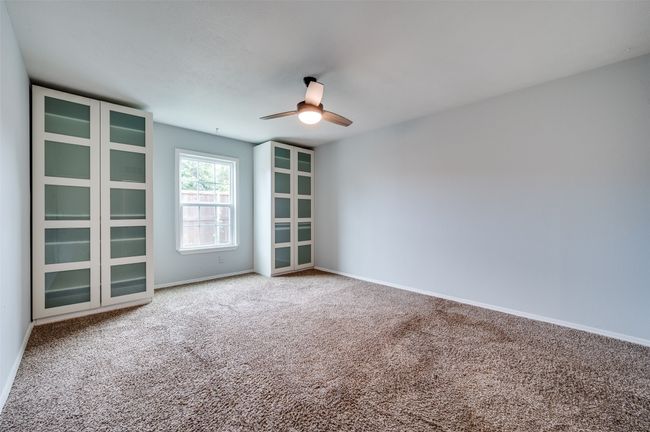 Spare room with carpet and ceiling fan | Image 12