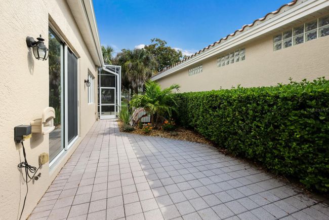 virtually staged covered lanai | Image 32