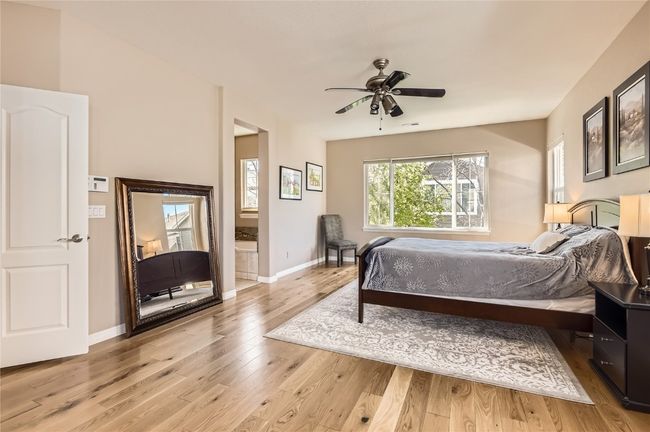 Abundant Windows with soothing natural light in this spacious Primary Bedroom. | Image 8