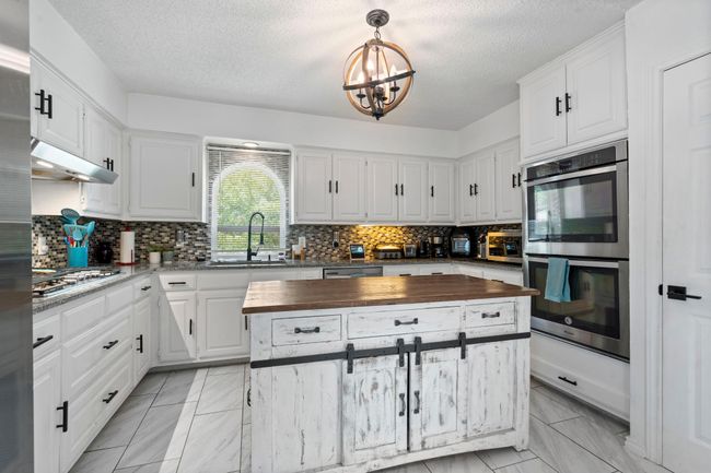 1426 Northridge Dr, House other with 4 bedrooms, 3 bathrooms and null parking in Carrollton TX | Image 12