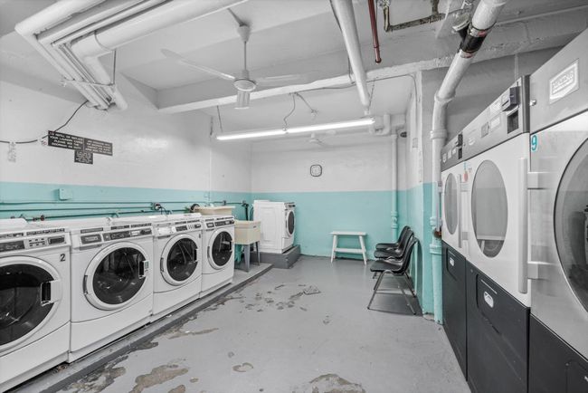 Shared laundry room featuring washing machine and clothes dryer and stacked washer / drying machine | Image 15