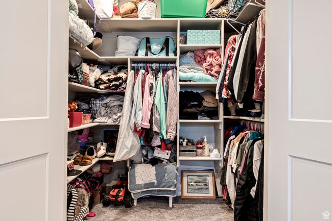 Walk in closet with carpet | Image 34