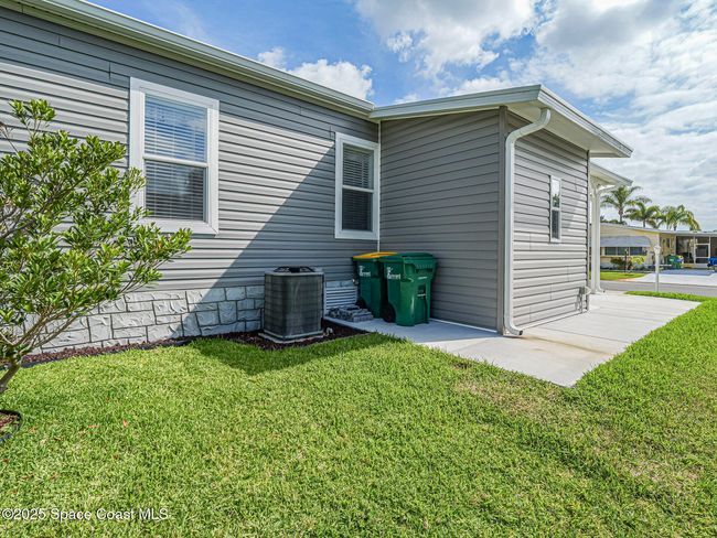 623 Hyacinth Cir, House other with 3 bedrooms, 2 bathrooms and null parking in Barefoot Bay FL | Image 44