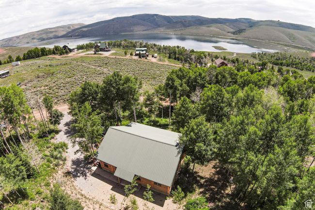 View of subject property with a water and mountain view | Image 40