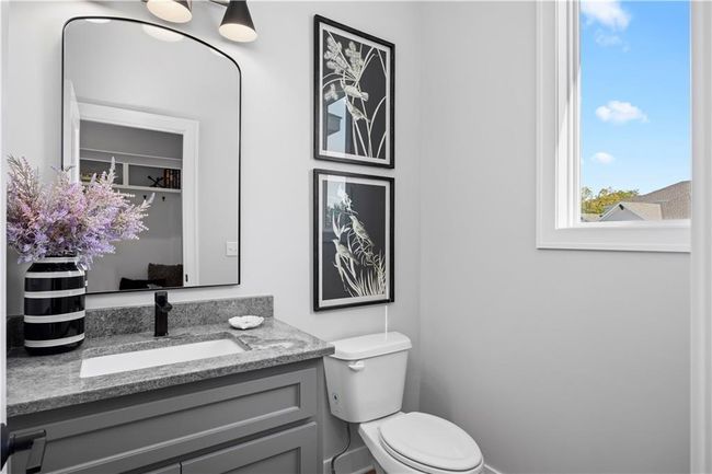 Powder Room on Main Level - Photo is from a finished model | Image 14