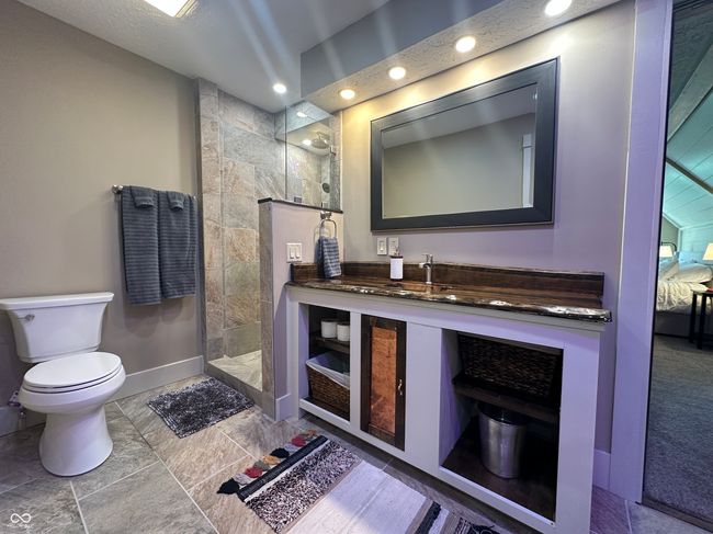 full bath featuring walk in shower, toilet, recessed lighting, baseboards, and vanity | Image 28