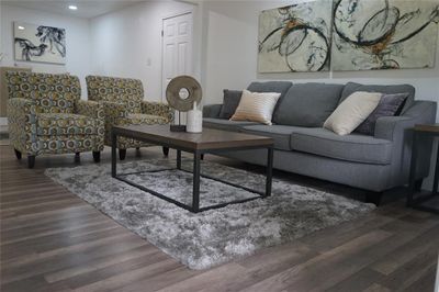 Living room with hardwood / wood-style floors | Image 3