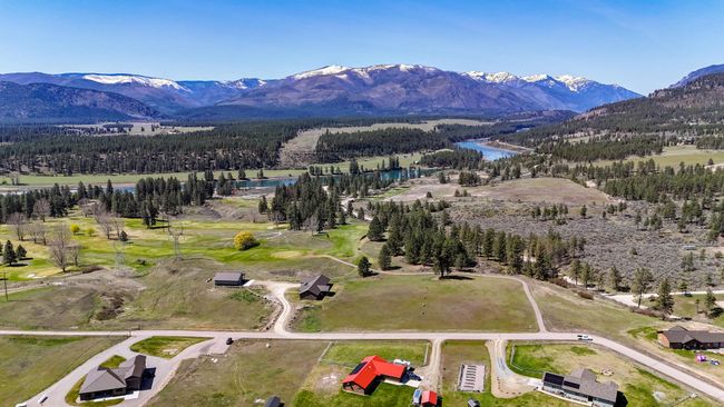 Bird's eye view with a water and mountain view and a wooded view | Image 31