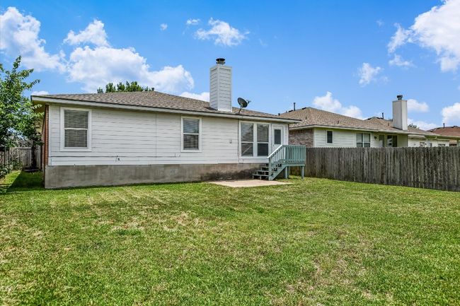 Rear view of property featuring a patio | Image 27