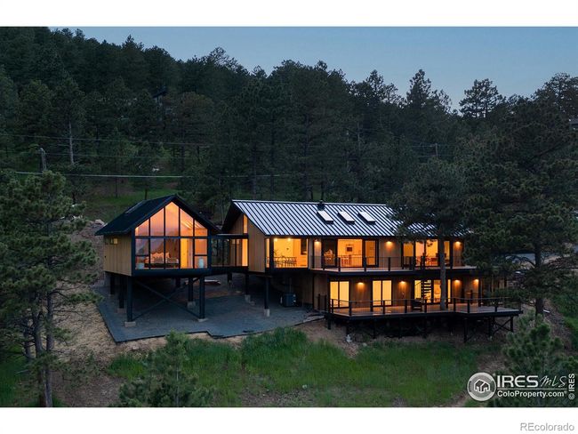 Bright & sun-filled one-acre lot with gently sloping meadow, walking access to trail systems | Image 35