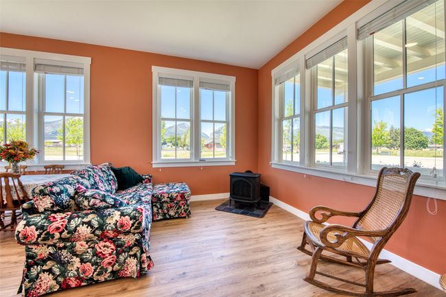 Living Room with Freestanding Gas Fireplace | Image 6
