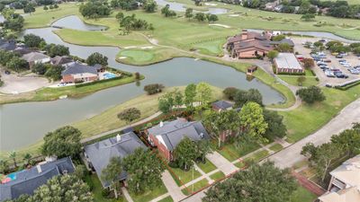 This impressive aerial view showcases the prime location of this lot, perfectly positioned with a scenic lake backdrop. | Image 3