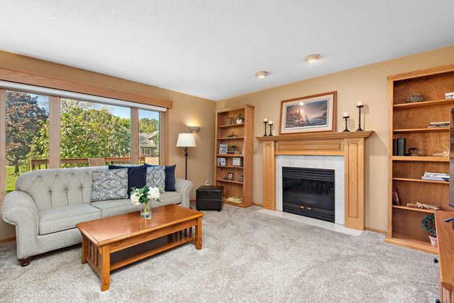 Family room with gas fireplace. | Image 13