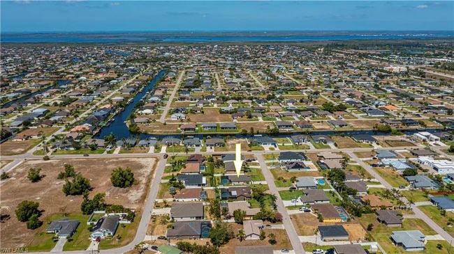 Birds eye view of property with a water view and a residential view | Image 28
