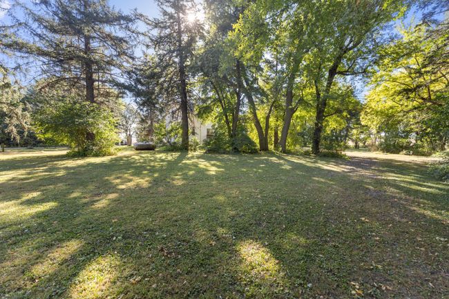 Up to date septic and mound system are located on the west side of the property. | Image 25