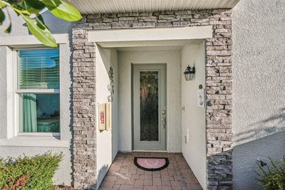 Lovely entrance for visitors with stacked stone. | Image 2