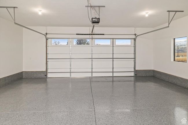 Garage with a garage door opener | Image 42