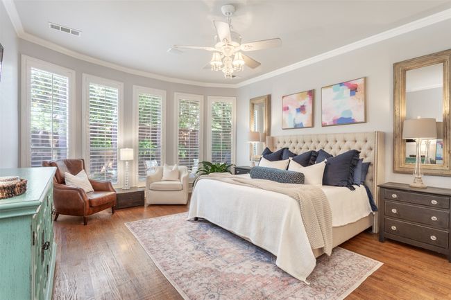Primary bedroom with lots of natural light overlooking the pool. | Image 15