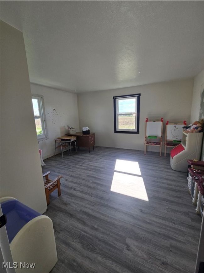 Game room featuring wood finished floors | Image 16