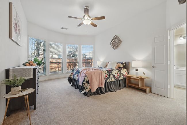 Master Bedroom with Large windows overlooking the backyard - Level 1 | Image 13