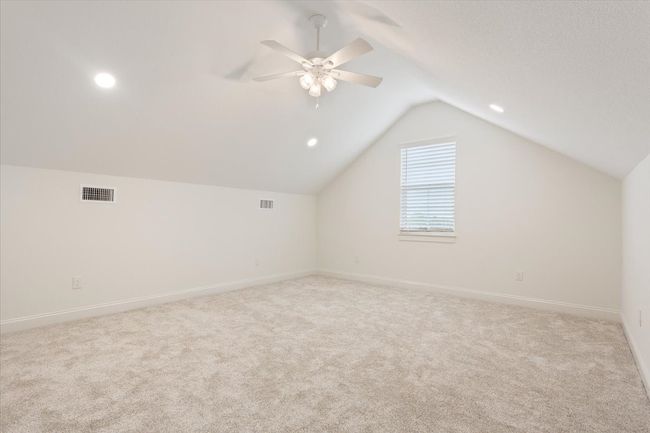 Bonus room featuring vaulted ceiling, carpet, a ceiling fan, and recessed lighting | Image 30