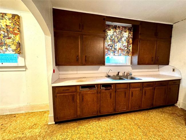 Part of kitchen and back room | Image 15
