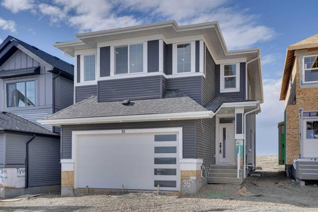 35 Heritage Circle, Home with 3 bedrooms, 2 bathrooms and 2 parking in Cochrane AB | Image 2
