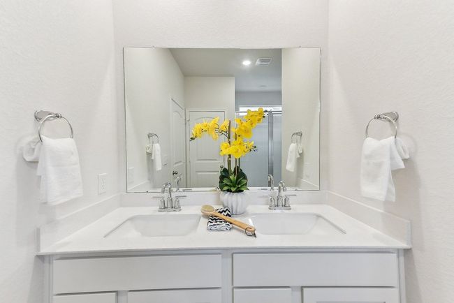 Fresh & Functional: Each bathroom features tasteful updates and modern finishes. | Image 14