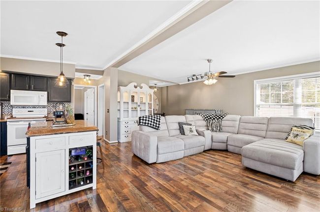 Freshly painted with neutral colors to match any decorating scheme. Large open living, dining & kitchen space...all with great views of Badin Lake | Image 8