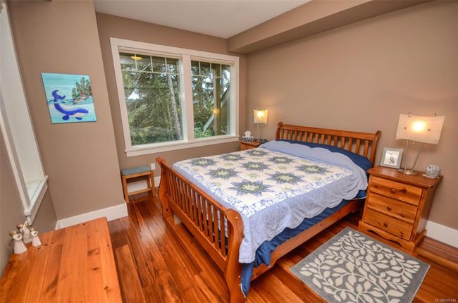 Bedroom featuring hardwood floors | Image 20
