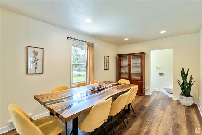 Dining room featuring recessed lighting and dark wood finished floors | Image 24