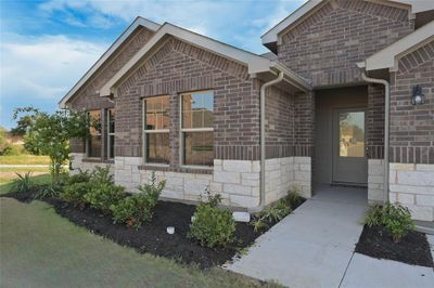 Covered Front porch and landscaped yard | Image 2