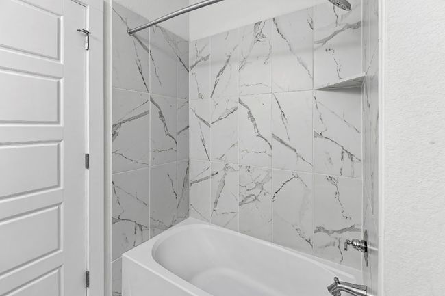 Full bath featuring shower / bathtub combination | Image 33