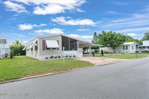 1015 Buttonwood St, Barefoot Bay, FL, 32976-7211 | Card Image