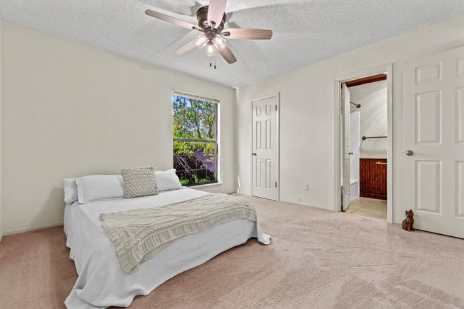 The room is spacious enough to fit a king-size bed with room left over for a dresser, nightstands, and even a small desk or reading chair. | Image 18