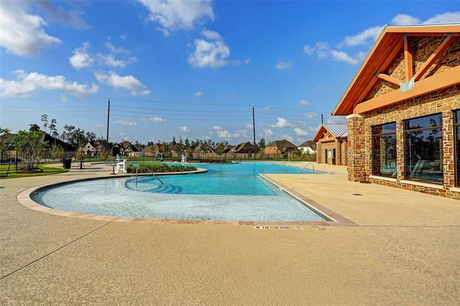 Boasting an array of amenities including parks, trails, pools, playgrounds, and a recreation center, Harmony provides residents with everything they need to live a luxurious and active lifestyle. These features not only promote physical well-being but also foster a strong sense of community among residents of all ages. | Image 35