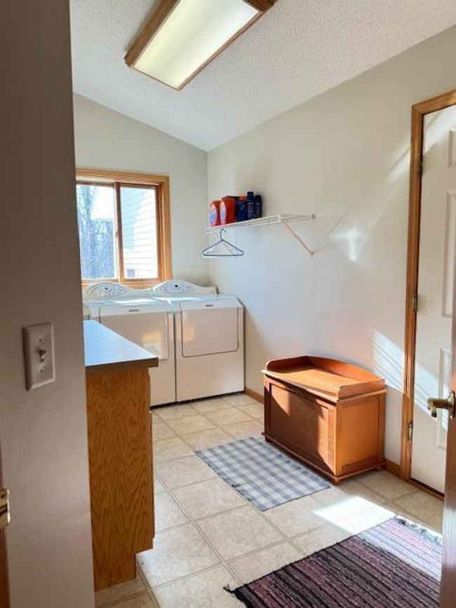 Convienient mud/laundry room of garage. with utility tub | Image 7
