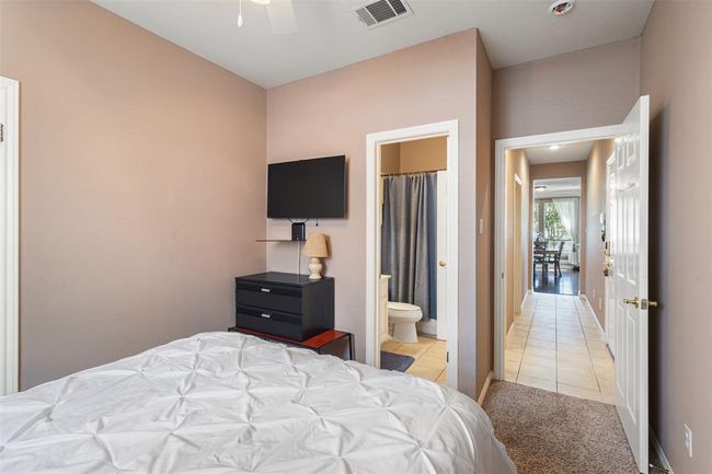 Private hallway to downstairs bedroom and a shared hallway bathroom. | Image 29