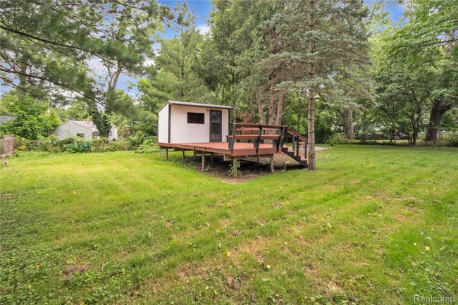 Former pool cabana with deck | Image 26